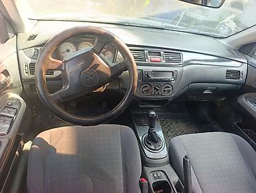 двери виш: Авторазбор Mitsubishi Lancer (седан, поколение 2003–2007). 1.6 бензин — 6