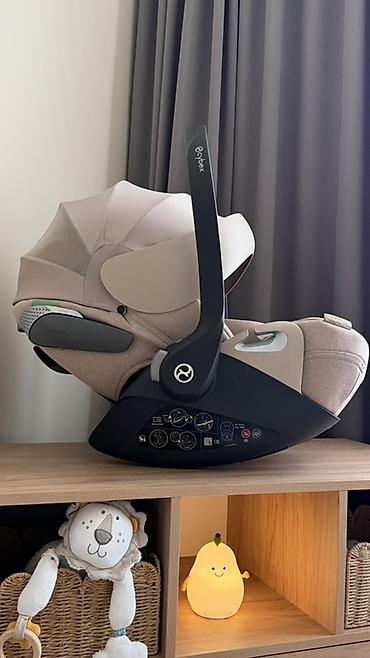 hipseat: Детское автокресло-переноска Cybex (группа 0+) в бежевом цвете — 1