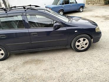prius baqaj: Opel Astra Caravan (universal) – tünd mavi rəng. Xüsusiyyətlər: - — 4