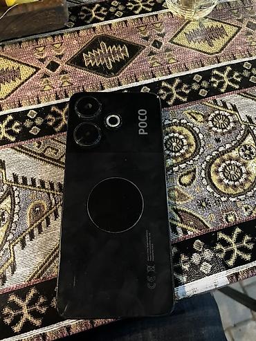 oyun telefonları ucuz: Poco C50, 128 GB, rəng - Qara, Simsiz şarj — 1