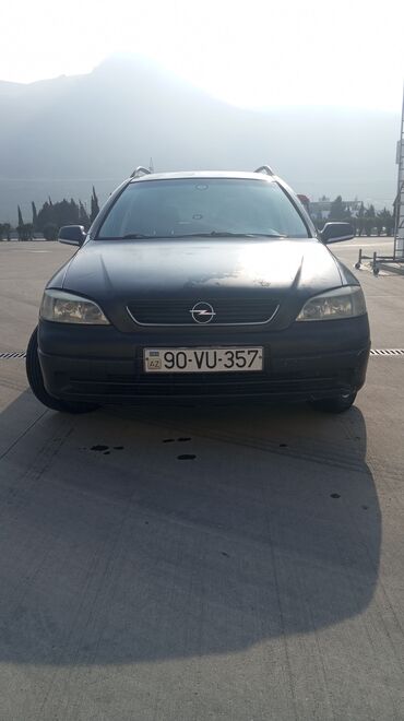 bmw 1 серия 116i mt: Opel Astra: 1.6 l | 1999 il | 482000 km Universal