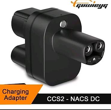 CCS2 → Tesla DC sürətli şarj adapteri Xüsusiyyətlər: - Uyğunluq: CCS