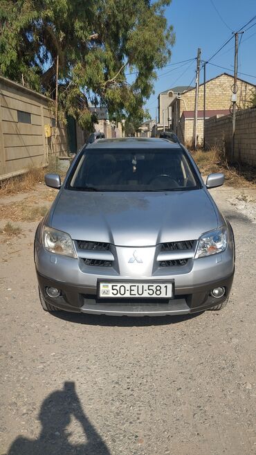 Mitsubishi: Mitsubishi Outlander: 2.4 l | 2006 il 394000 km Krossover — 2