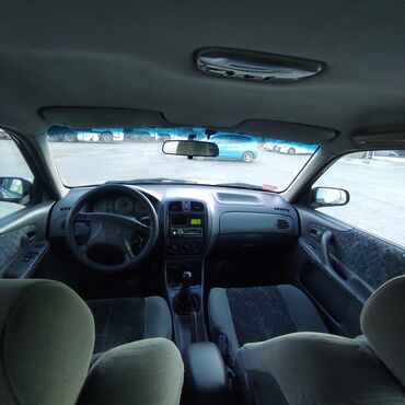 Mazda: Mazda Familia: 1998 г., 1.5 л, Механика, Бензин, Хэтчбэк — 13