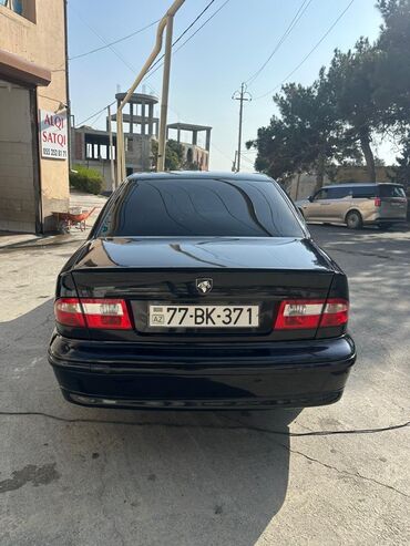 Iran Khodro: İran Khodro Samand (sedan), qara rəng. Xüsusiyyətlər: - Kuzov: 4 — 2