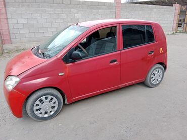 Транспорт: Daihatsu Cuore: 2004 г., 1 л, Механика, Бензин, Хетчбек