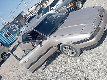 бампер сди: Mazda 323: 1990 г., Механика, Седан — 5