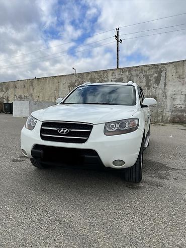 kia rio sukan: Hyundai Santa Fe: 2 l | 2009 il Krossover — 1