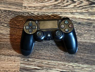 Беспроводной геймпад Sony DualShock 4 (модель CUH-ZCT1E), цвет черный