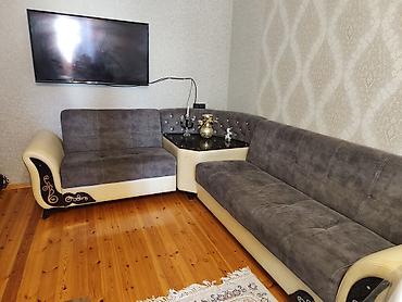 kohnə divan: Divan satılır!Açılıb-bağlanır alt hissəsi dolaplı kənarları ağ dəri — 1