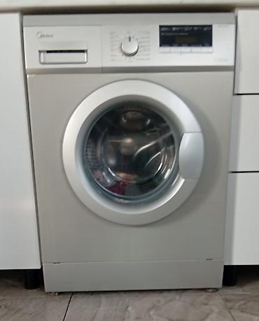 Midea paltaryuyan maşın – 7 kq tutum. • Ön yükləməli model, iri