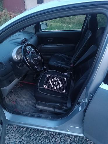 авто зикир: Daihatsu Sirion: 2008 г., 1.5 л, Механика, Бензин, Хэтчбэк — 6