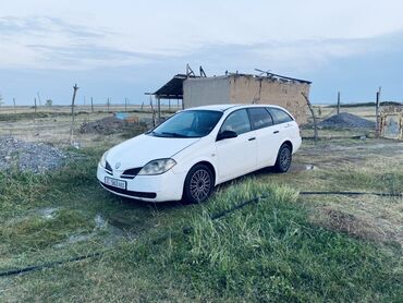 рейлинги гольф: Nissan Primera: 2002 г.