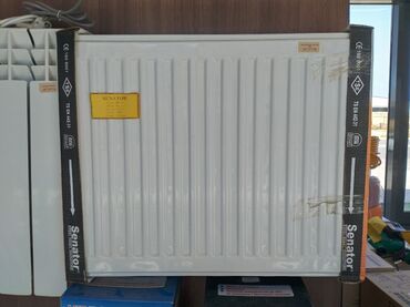 Radiatorlar: İstilik radiatoru ağ rəngdə, şaquli panellərlə hazırlanmışdır. Bu