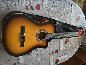gitara capo: Salam Gitar əla vəziyətdədir istifadə olunmuyub hecbir problemi yoxdur — 3