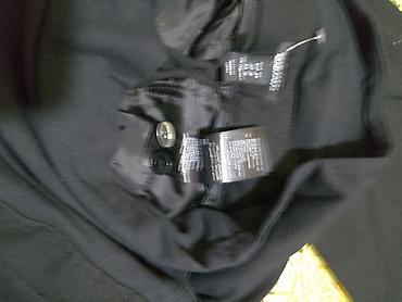 Pantalone: H&M trudnicke pantalone,crna boja.Sasvim nove.Velicina M — 6