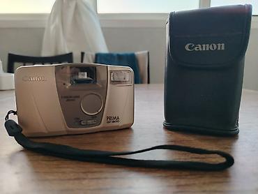 Фотоаппараты: Canon firmasının "Prima BF-800" model fotoaparatı satılır. 90-cı — 1