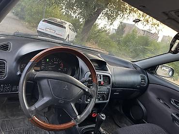 evo 2: Mitsubishi Carisma: 1999 г., 1.8 л, Автомат, Бензин, Седан — 7
