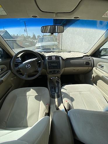 mazda 2004: Mazda 323: 2003 г., Автомат, Бензин, Седан — 4