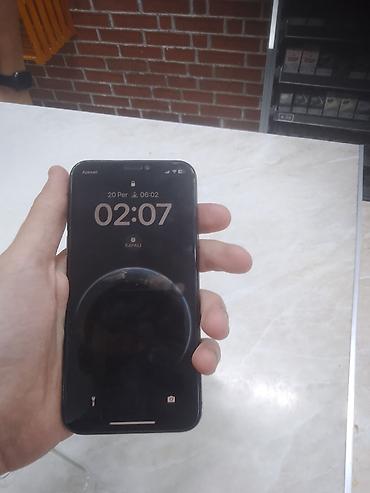 apple i̇pad: IPhone X, 64 GB, Black Titanium, Face ID — 1