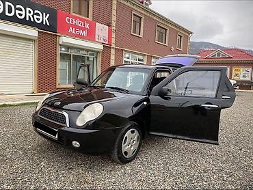 LIFAN: Lifan 320, 5 qapılı kompakt hetçbek. Xarici: - Qara rəng, xrom qapı — 10