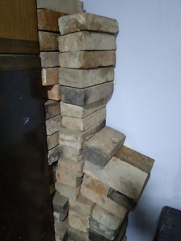 Tikinti daşları: Dekorativ Sovetin kerpici, yaxsi veziyyetdedir, islenmis. 200 ədəd var — 2