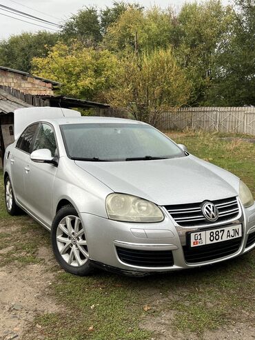 Volkswagen: Volkswagen Jetta: 2010 г., 2.5 л, Типтроник, Газ, Седан