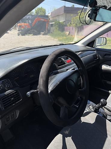 мото 300: Mitsubishi Lancer: 2003 г., 1.6 л, Механика, Газ, Универсал — 5