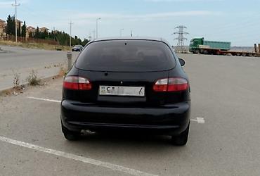 vaz 2109 kapot: Daewoo Lanos, 5 qapılı hetçbek, qara rəng. - Yanacaq: benzin - — 2