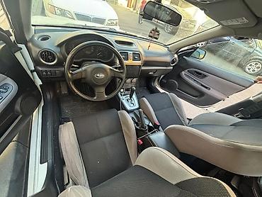 kovş: Subaru Impreza: 2 l | 2007 il 301000 km Sedan — 9