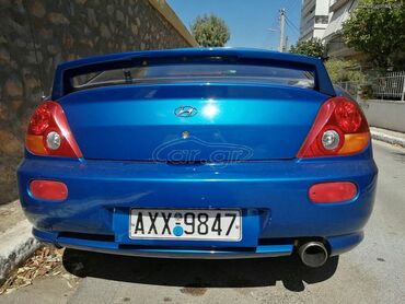 Transport: Hyundai Coupe: 1.6 l | 2004 year Coupe/Sports