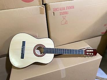 Гитары: Гитары,укулеле. Размеры гитар Все новое !!! Размер укулеле 26. Виды — 23