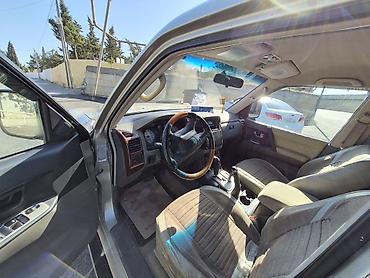 mitsubishi pajero 2000: Mitsubishi Pajero SUV - Korpus: qızılı/bej rəng, 5 qapı, yan — 9