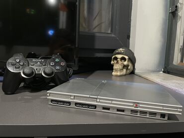 PS2 & PS1 (Sony PlayStation 2 & 1): Playstation 2 Slim SCPH-75004 HDMI Nadir olan gümüşü rəng. Oyunlar