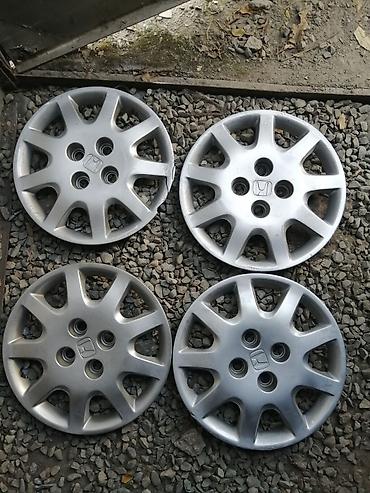 Колпаки R14 Honda 4шт оригинал, на одном есть трещины lalafo.kg да Колпаки R14 Honda 4шт оригинал, на одном есть трещины
