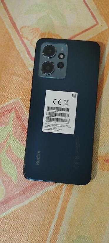 Redmi: Xiaomi Redmi Note 12 (görsellərdə) - Ekran: 6.67" AMOLED, mərkəzi — 5