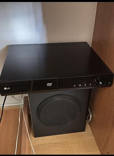 Музыкальные центры: LG ev kinoteatrı – DVD pleyer + akustika sistemi Xüsusiyyətlər: - LG — 1