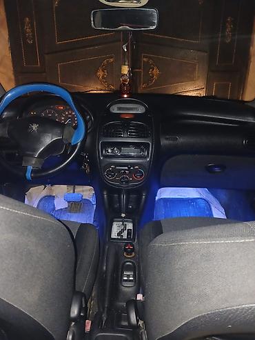 maqnitola az: Peugeot 206: 1.4 l | 2003 il 342000 km Hetçbek — 1