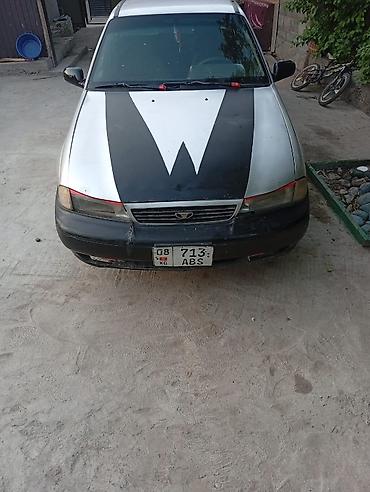 Транспорт: Daewoo Nexia: 1999 г., Бензин, Седан — 3