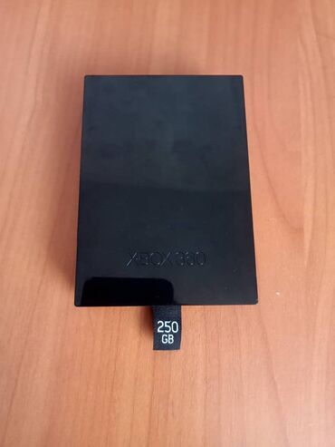 Xbox 360: 1- жёсткий диск для Xbox 360 slim оригинальный отдам за 1500 сом 2-