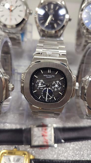bakida saat: Patek Philippe Nautilus üslubunda kişi saatları – polad korpus və — 6