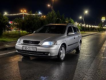 opel təkərləri: Opel Astra G (universał) – gümüşü rəng Texniki və komplektasiya: - — 1