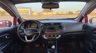 Kia: Kia Pride: 1.4 l | 2013 il Sedan — 13