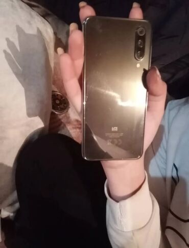 Xiaomi: Xiaomi Mi 9 SE, 64 GB, rəng - Qara, 
 Sensor, Barmaq izi, İki sim kartlı