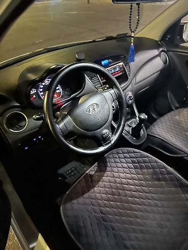 byd e1: Hyundai i10: 2011 г., 1.1 л, Механика, Бензин, Хэтчбэк — 3