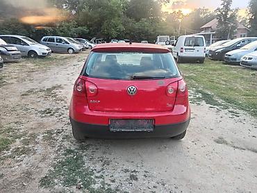 kombi 8 1: Volkswagen Golf V – hečbek, 5 vrata, crvena boja. Motor TDI dizel — 7