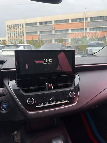 машины до 500: Toyota Corolla: 2023 г., 1.8 л, Автомат, Гибрид, Седан — 4