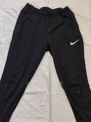 əskər geyimi: Спортивные Мужские брюки, Nike, M (EU 38), цвет - Черный