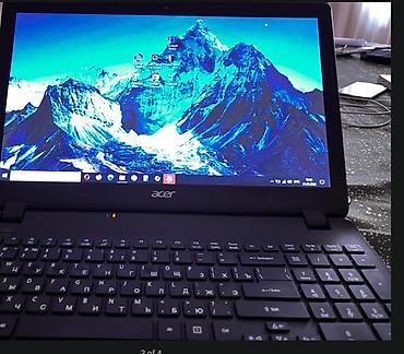Ноутбуки и аксессуары: Acer brendinə məxsus qara rəngli noutbuk. Cihazda Intel prosessoru — 1