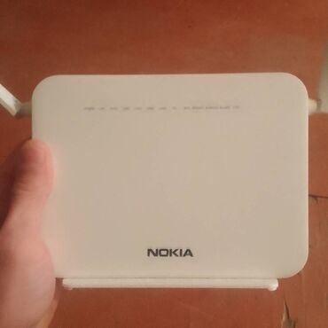 nokia internet modem: Wi-fi modem Nokia. Cemi 1 defe acib isletmisem. Tam olarak yenidir